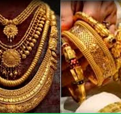 സ്വർണ്ണാഭരണങ്ങൾ പ്രദർശിപ്പിച്ചിരിക്കുന്ന ഒരു കടയുടെ ചിത്രം