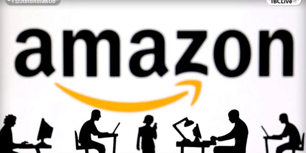 Amazon-ന്റെ ലോഗോയും ഒരു backpack-ന്റെ ചിത്രവും ചേർത്ത് കാണിക്കുന്ന ചിത്രം. സുരക്ഷാ മുന്നറിയിപ്പ് സൂചിപ്പിക്കുന്ന ഒരു ചിഹ്നവും ഇതിൽ കാണാം.