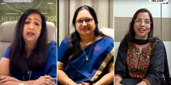സ്കൂൾ പ്രിൻസിപ്പൽ വീഡിയോ കോൺഫറൻസിലൂടെ സംസാരിക്കുന്ന ചിത്രം.