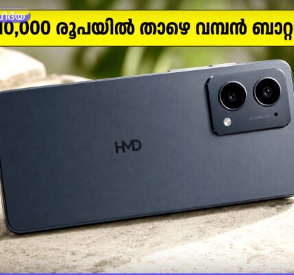 വെളുത്ത പശ്ചാത്തലത്തിൽ, നീല നിറത്തിലുള്ള HMD Vibe 2 5G സ്മാർട്ട്ഫോൺ അതിന്റെ പ്രധാന ഭാഗങ്ങൾ വ്യക്തമാക്കുന്ന തരത്തിൽ പ്രദർശിപ്പിച്ചിരിക്കുന്നു.